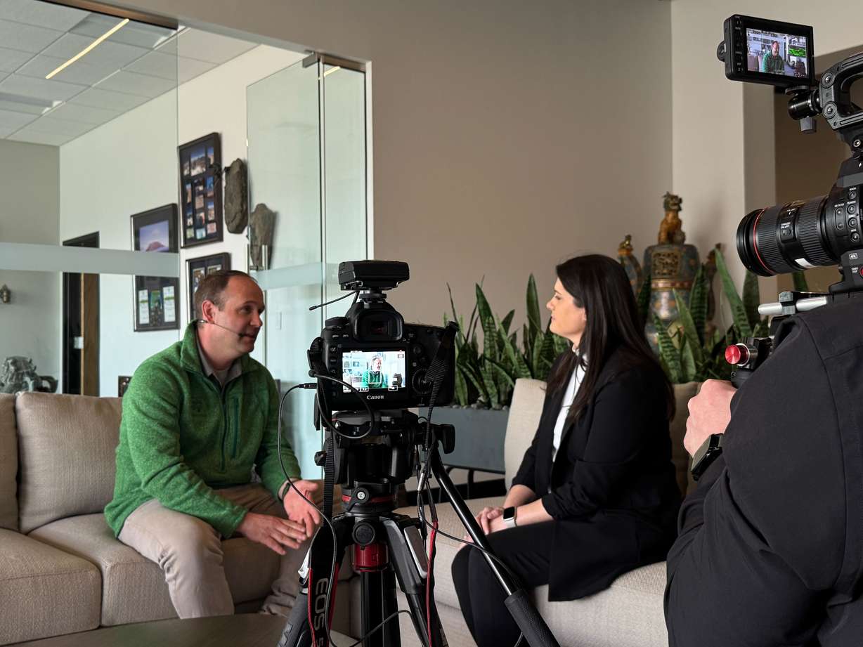 The Young Automotive Group’s innovations director Oliver Young talks with Snap-on Equipment senior marketing manager Allison Moody.