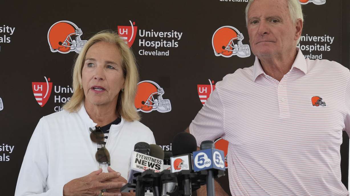 FILE - Cleveland Browns owners Dee and Jimmy Haslam speak during an NFL football training camp practice in White Sulphur Springs, W.Va., Saturday, July 27, 2024.