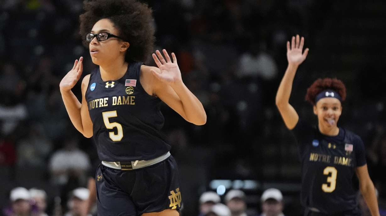 Notre Dame guard Olivia Miles (5) reacts after making a 3-point basket against TCU during the first half in the Sweet 16 of the NCAA college basketball tournament, Saturday, March 29, 2025. in Birmingham, Ala.
