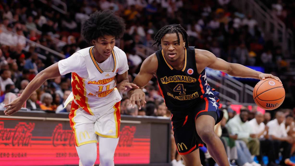Isaiah Collier (4) of McDonald's All American Boys West drives to the basket during the McDonalds All American Basketball Games at Toyota Center on March 28, 2023 in Houston, Texas.