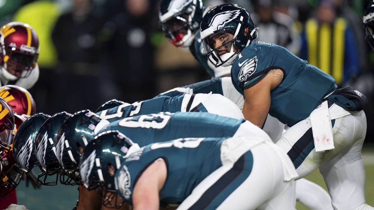 FILE - Philadelphia Eagles quarterback Jalen Hurts (1) lines up for the goal line Tush Push play during the NFL championship playoff football game against the Washington Commanders, Jan. 26, 2025, in Philadelphia.