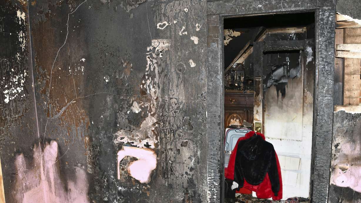 Connecticut police have released more than 100 photos showing the inside of a home where a 32-year-old man said he started a fire in a desperate attempt to free himself from more than 20 years of captivity.