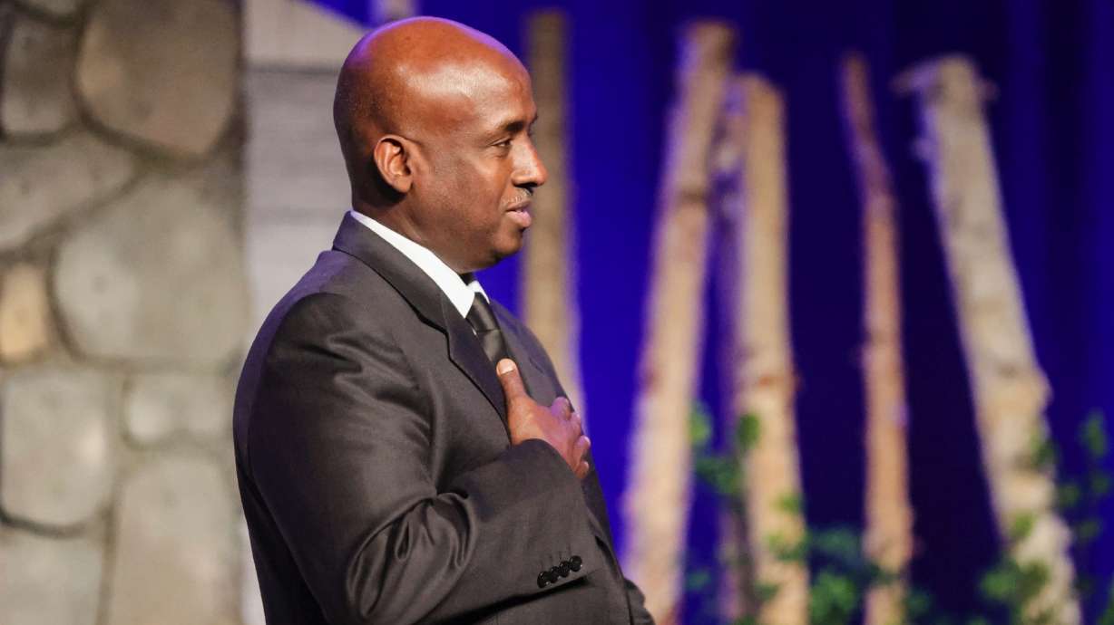 Aden Batar of Catholic Community Services of Utah says the organization is winding down its refugee program due to funding cuts. He's pictured in Salt Lake City on May 19, 2022.