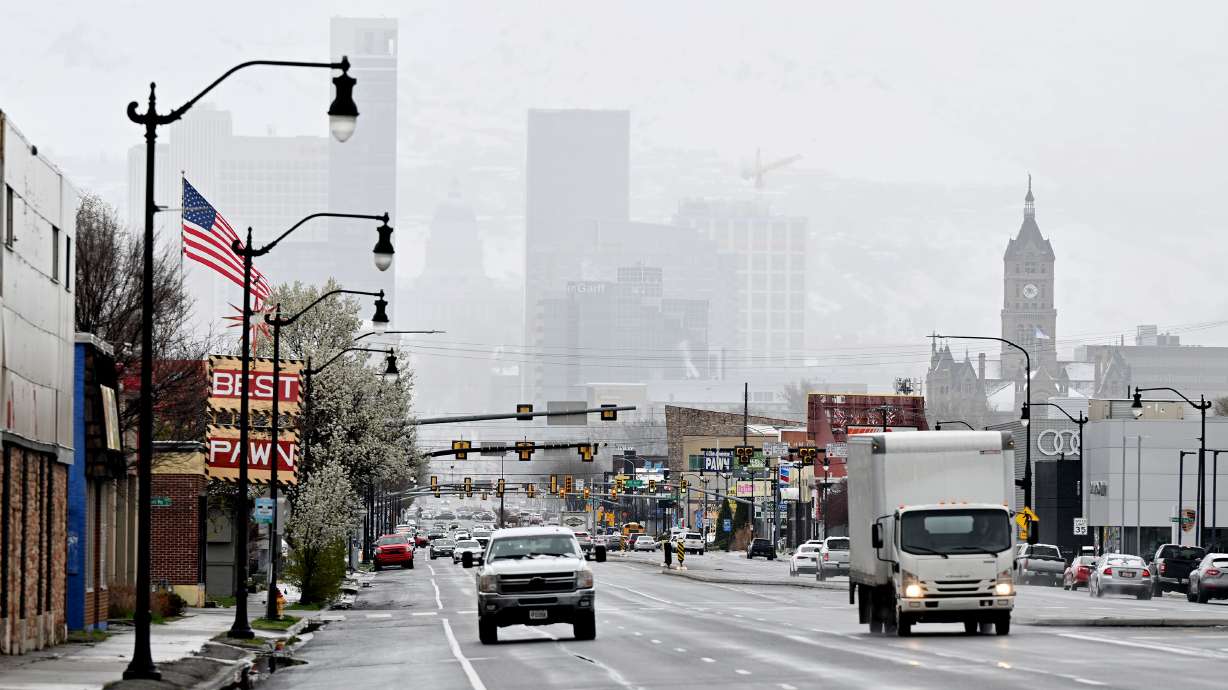 Snow falls in waves in Salt Lake City on April 1. The National Weather Service on Saturday issued a winter weather advisory for parts of Utah's mountains ahead of a storm that could also produce the first valley snow of the season.