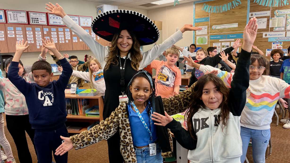 Lucia de la Cruz Rodriguez, a third-grade teacher in the Spanish-English dual-language immersion program at Midvale Elementary School in Midvale, with her students on Friday.