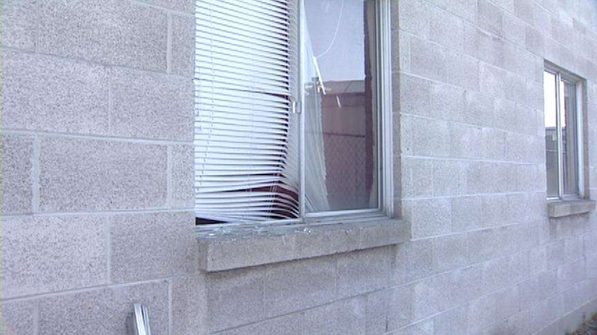 Woman held hostage, rescued by neighbor