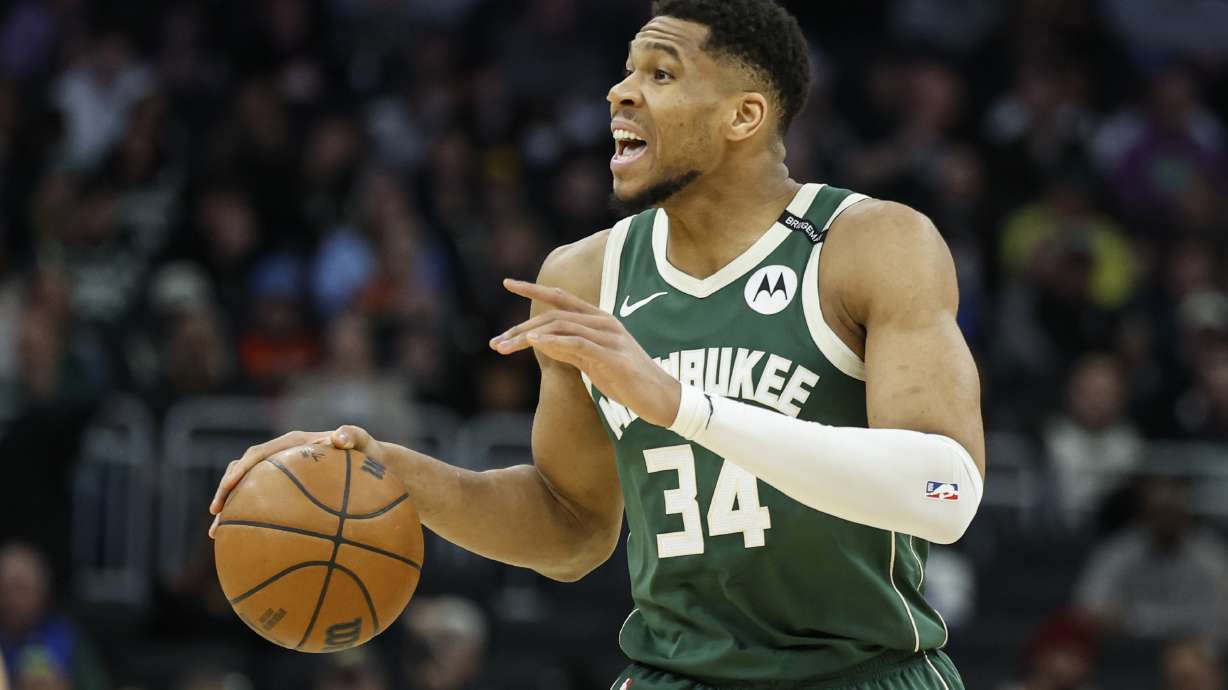 Milwaukee Bucks' Giannis Antetokounmpo shouts instruction to teammates against the Phoenix Suns during the first half of an NBA basketball game Tuesday, April 1, 2025, in Milwaukee.