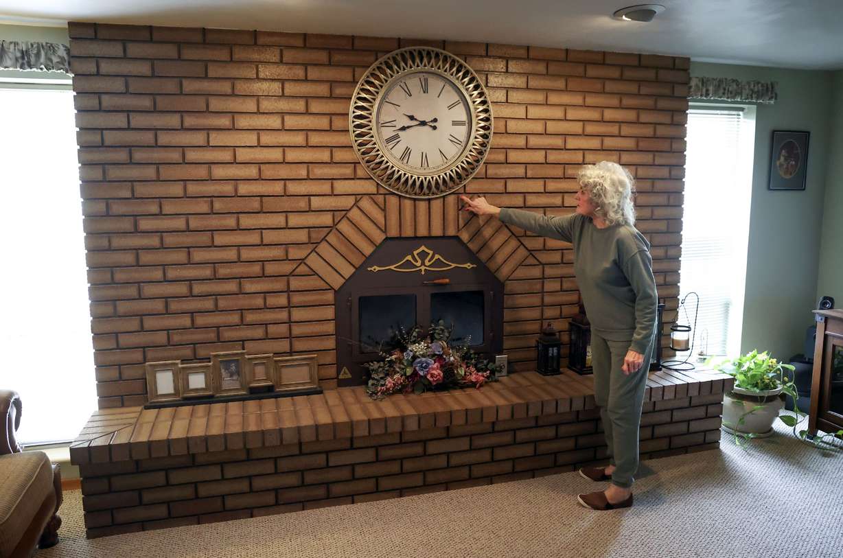 Cheryl Johnson shows the detail in the masonry work that her late husband did at her home, which she has lived in for nearly 60 years, in South Salt Lake on Feb. 24, 2022.