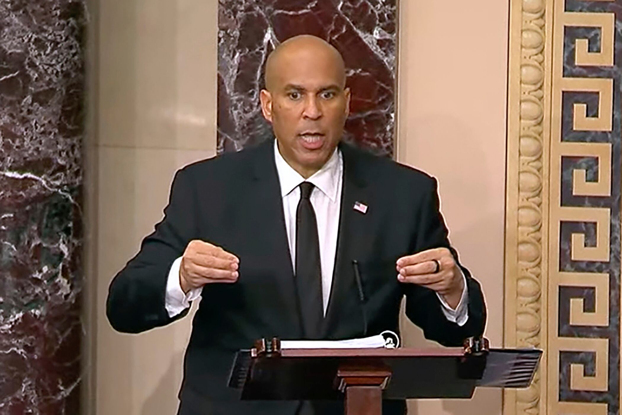 In this image provided by Senate Television, Sen. Cory Booker, D-N.J., speaks on the Senate floor, Tuesday morning, April 1.