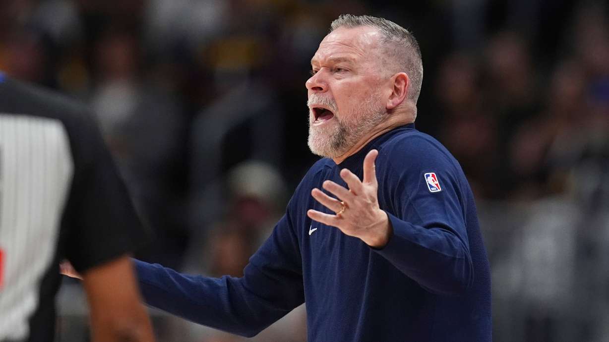 Denver Nuggets head coach Michael Malone argues for a call in the second half of an NBA basketball game against the Utah Jazz, Friday, March 28, 2025, in Denver.