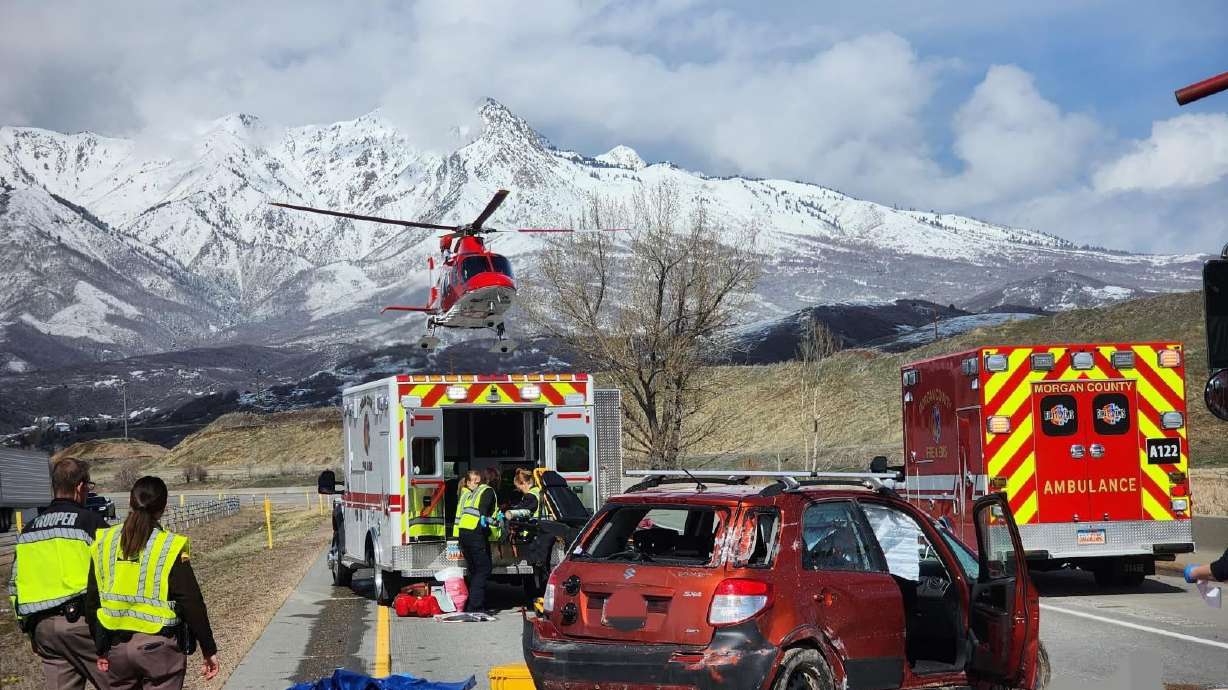 Law enforcement responds to a crash where one person was killed after crashing into a barrier in Morgan County.