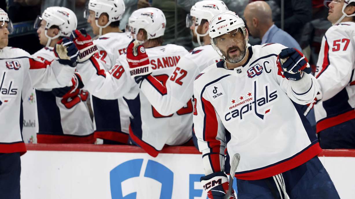 Washington Capitals' Alex Ovechkin (8) celebrates a goal against the Carolina Hurricanes during the second period of an NHL hockey game in Raleigh, N.C., Wednesday, April 2, 2025.