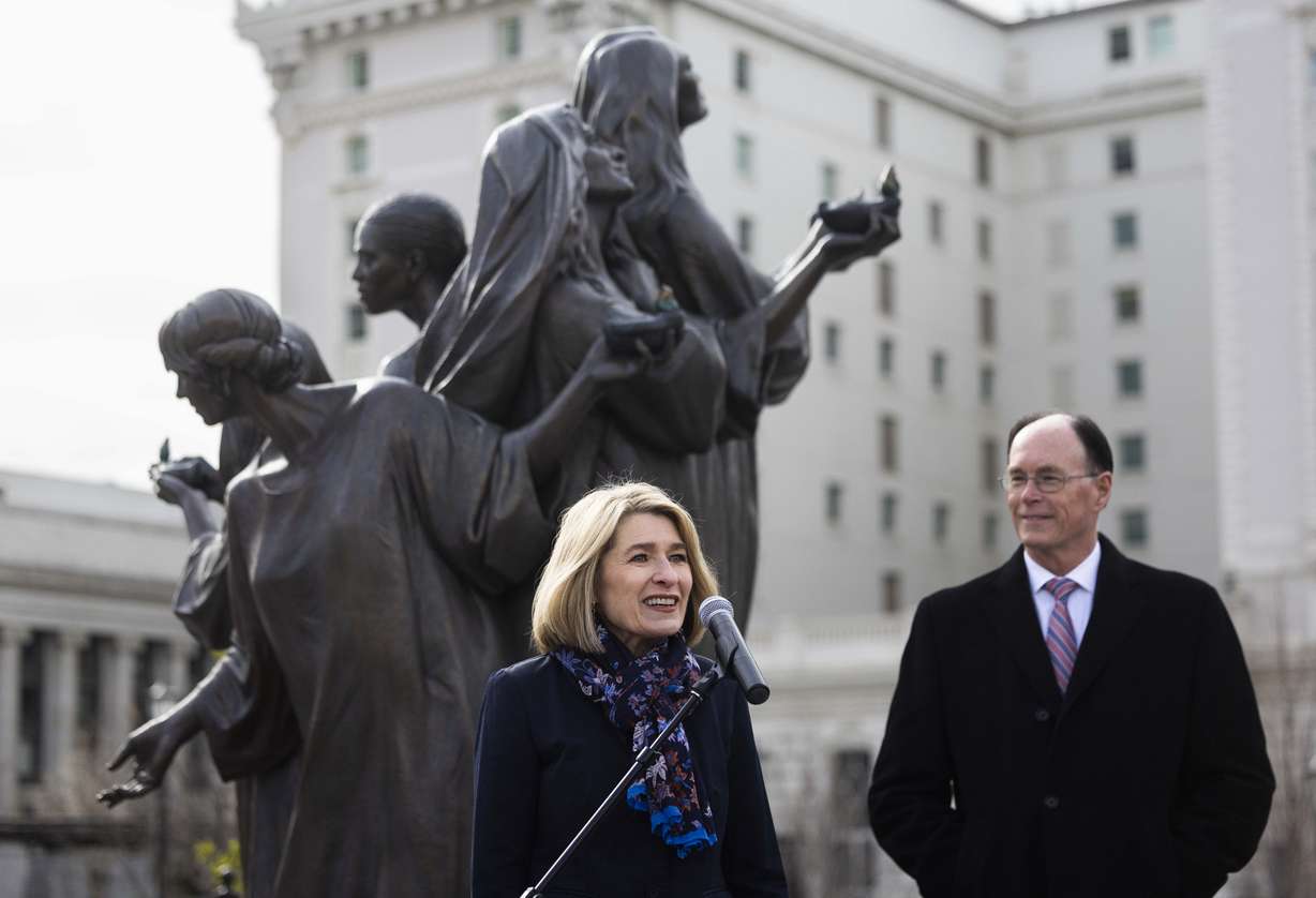 Relief Society General President Camille N. Johnson of The Church of Jesus Christ of Latter-day Saints speaks to media during the unveiling of the sculpture Five Wise Virgins, created by artist Ben Hammond, on Temple Square in Salt Lake City on Wednesday.