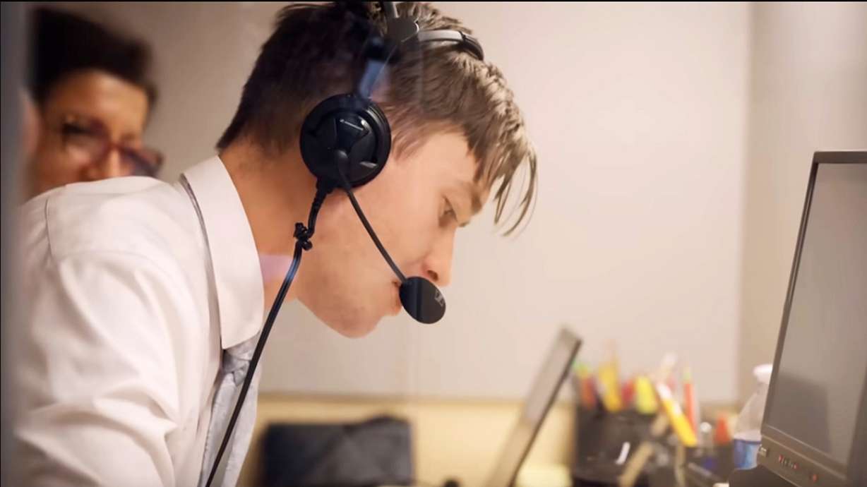 A member of one of the 57 language interpretation teams in Salt Lake City and 143 teams worldwide interprets the messages of speakers during general conference of The Church of Jesus Christ of Latter-day Saints. Photo is a screenshot from a Behind the Scenes of General Conference video.