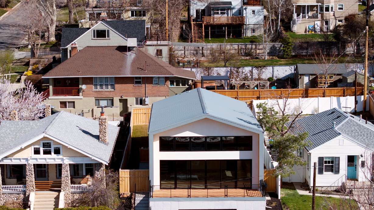 Homes in the Avenues neighborhood of Salt Lake City are pictured on March 27. Mortgage rates have slowly been sliding downward since reaching above 7% in January, but will President Donald Trump's sweeping new tariffs reverse that trend?