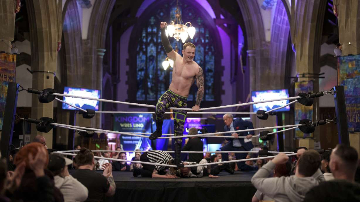 Billy O'Keefe celebrates victory in a six-man-scramble at a Kingdom Wrestling show at St Peter's Church in Shipley, Saturday, March 29, 2025.