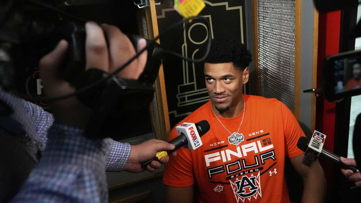 Auburn center Dylan Cardwell speaks in the locker room during media day at the Final Four of the NCAA college basketball tournament, Thursday, April 3, 2025, in San Antonio.