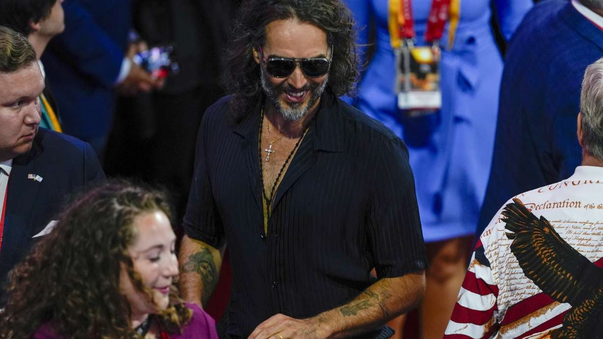 Actor Russell Brand is seen during the Republican National Convention, July 18, 2024, in Milwaukee. British police charged him Friday with rape and sexual assault against four women that allegedly took place between 1999 and 2005.