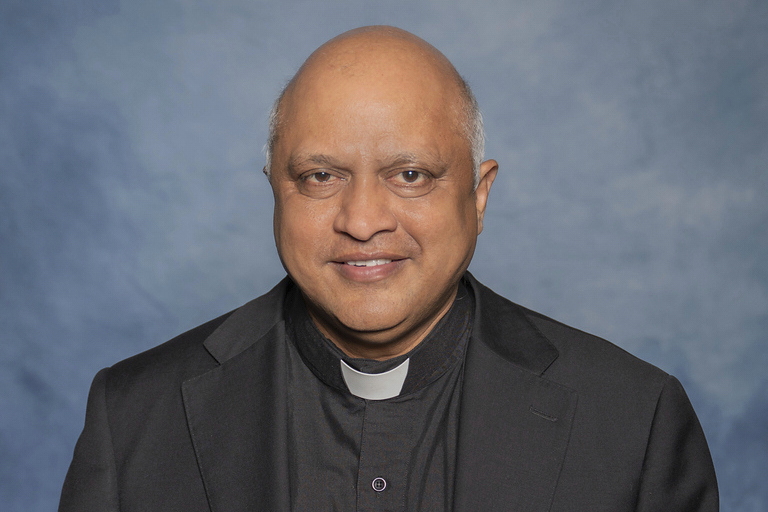 In this undated photo provided by The Leaven shows Rev. Arul Carasala, a pastor at Saints Peter and Paul Catholic Church in Seneca, Kan., who was fatally shot Thursday.