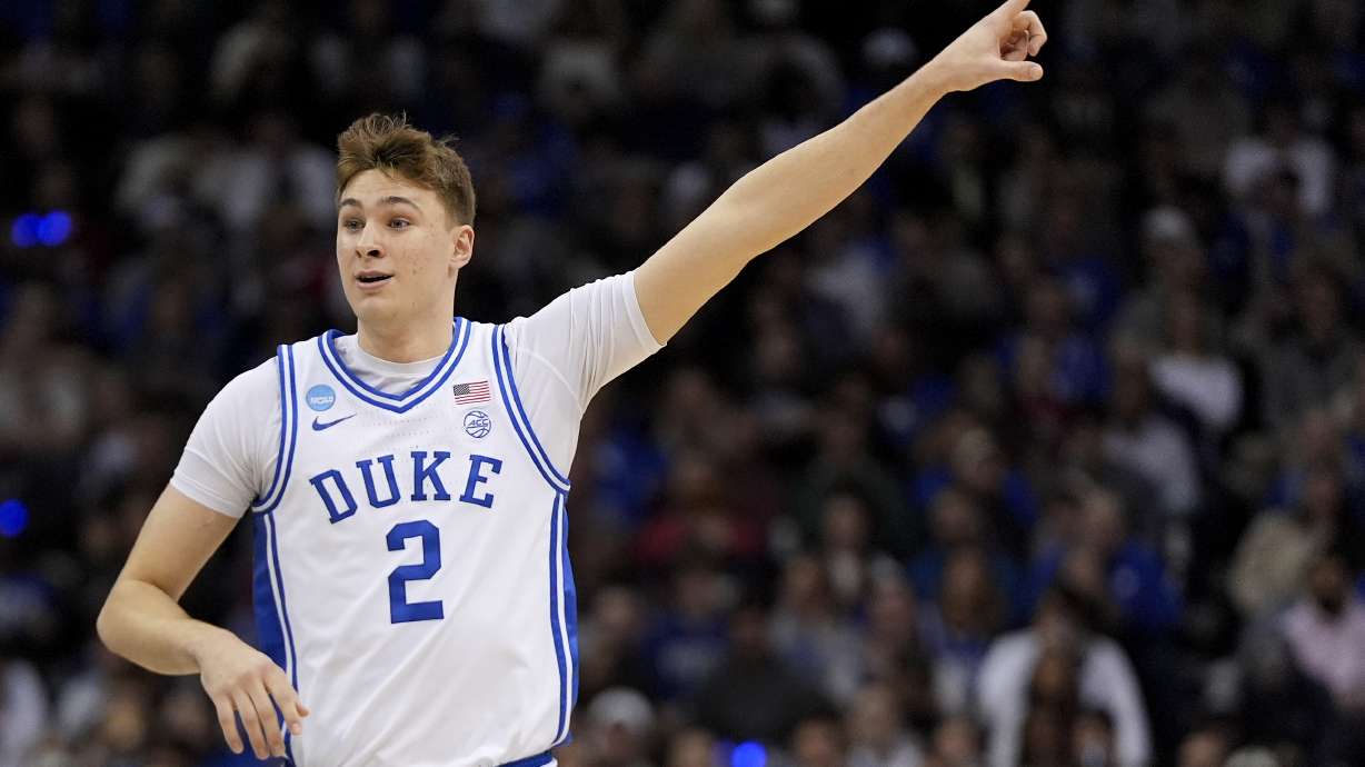 Duke forward Cooper Flagg (2) motions during the first half of an Elite Eight round NCAA college basketball tournament game against the Alabama, Saturday, March 29, 2025, in Newark, N.J.
