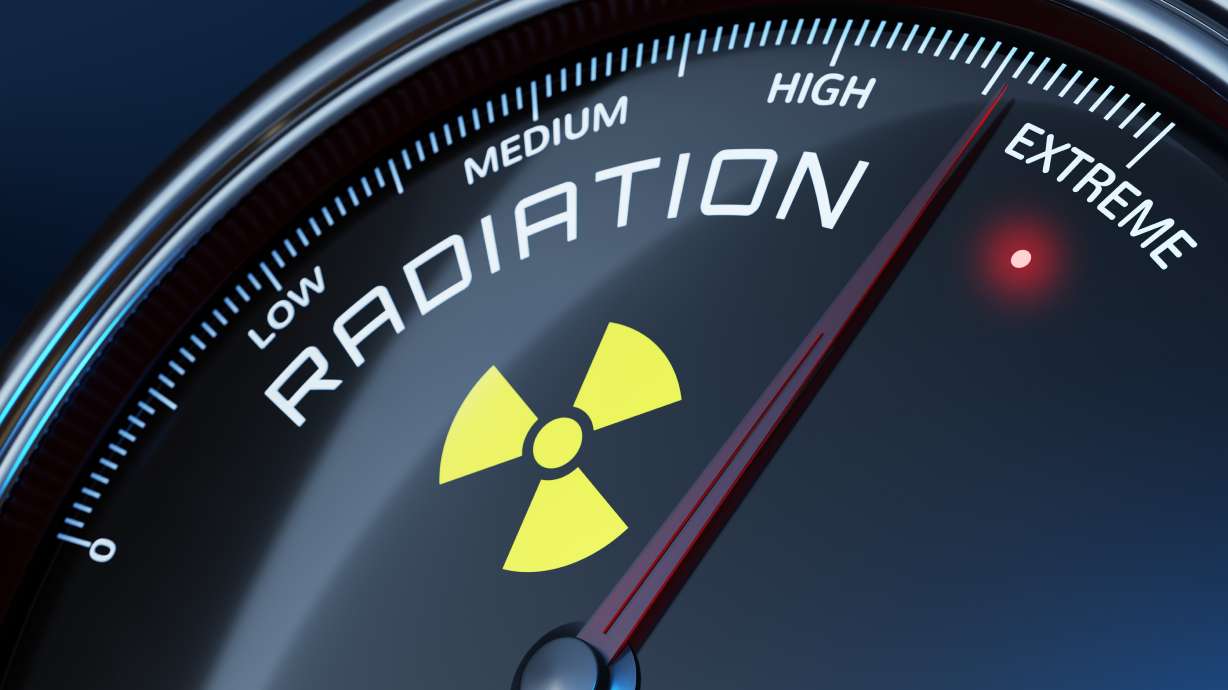 A radiation gauge with its needle nearing "extreme" (closeup)