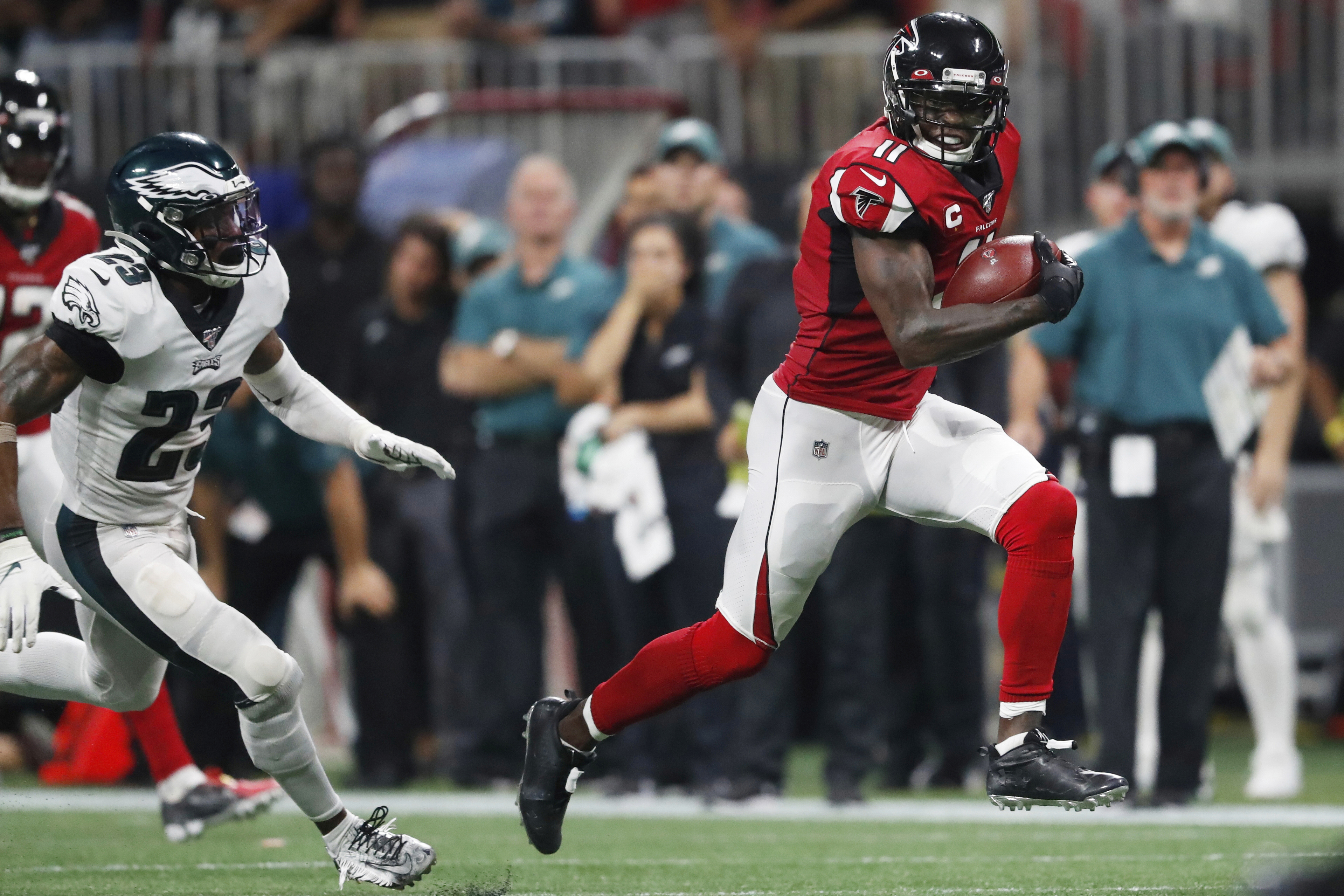 FILE - Atlanta Falcons wide receiver Julio Jones (11) runs toward the end zone for a touchdown against Philadelphia Eagles free safety Rodney McLeod (23) during the second half of an NFL football game, Sunday, Sept. 15, 2019, in Atlanta.