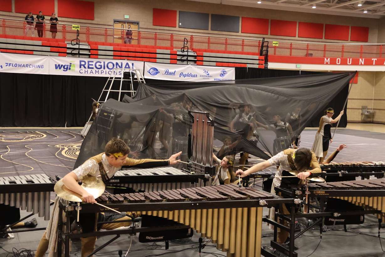 The Mountain Ridge High School winter percussion ensemble performs at Mountain Ridge High School in Herriman. The performance "Echoes of Ashes" depicts the eruption of Mount Vesuvius in Pompeii.