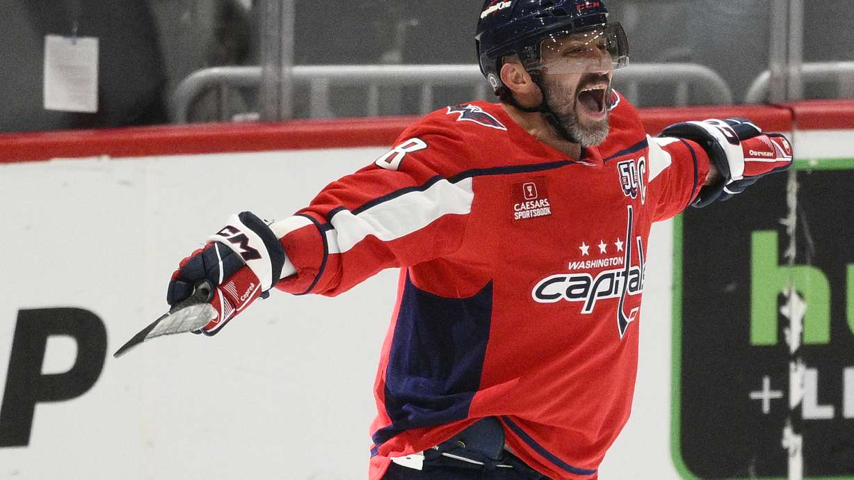 Washington Capitals left wing Alex Ovechkin (8) celebrating his 894th goal during the third period of an NHL hockey game against the Chicago Blackhawks, Friday, April 4, 2025, in Washington.