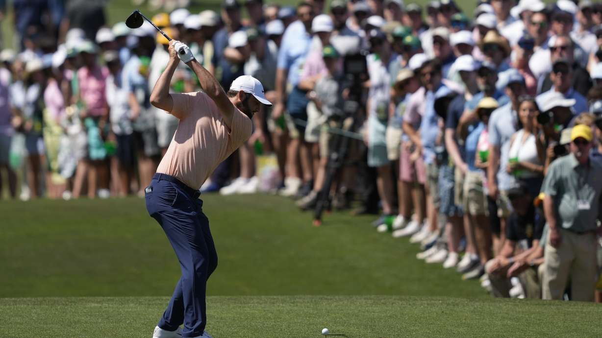FILE - Scottie Scheffler hits his tee shot on the third hole during final round at the Masters golf tournament at Augusta National Golf Club Sunday, April 14, 2024, in Augusta, Ga.