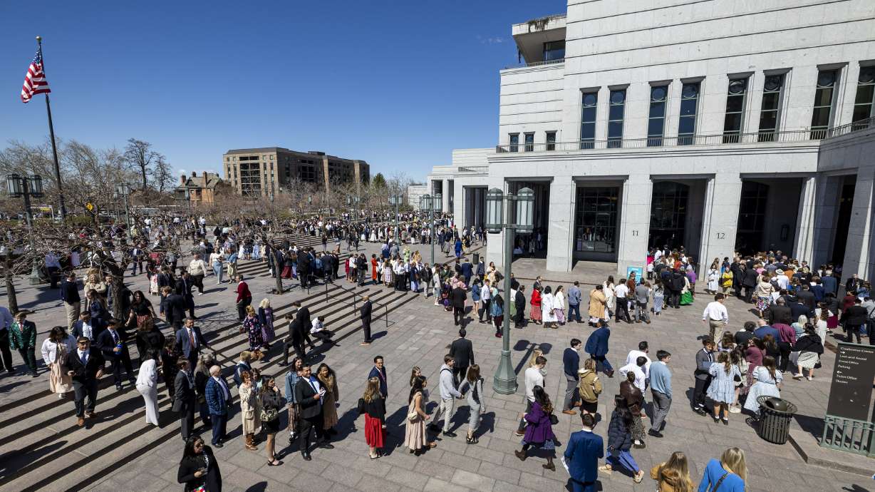 Conferencegoers line up to enter the Conference Center before the afternoon session of the 195th Annual General Conference of The Church of Jesus Christ of Latter-day Saints in Salt Lake City on Saturday.