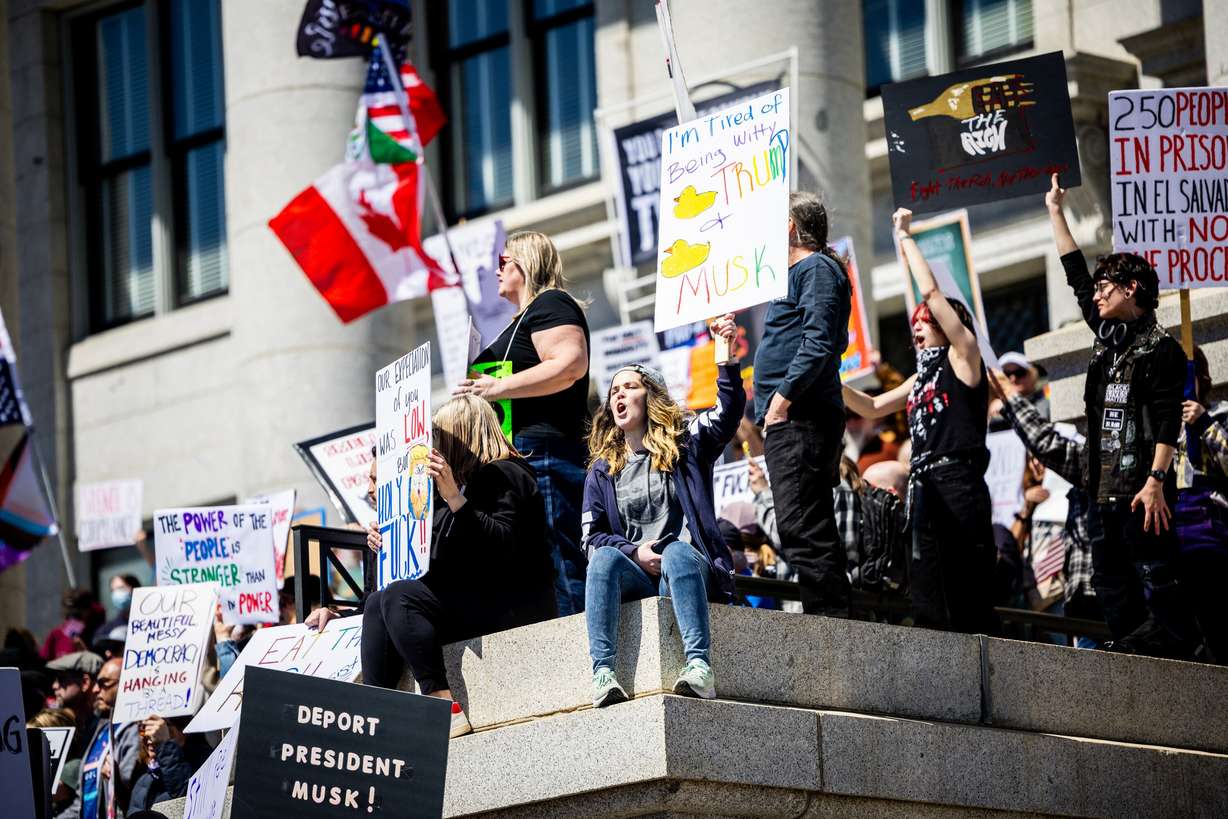 Utahns protest during a National Day of Protest against President Donald Trump and Elon Musk at the Capitol in Salt Lake City on Saturday.