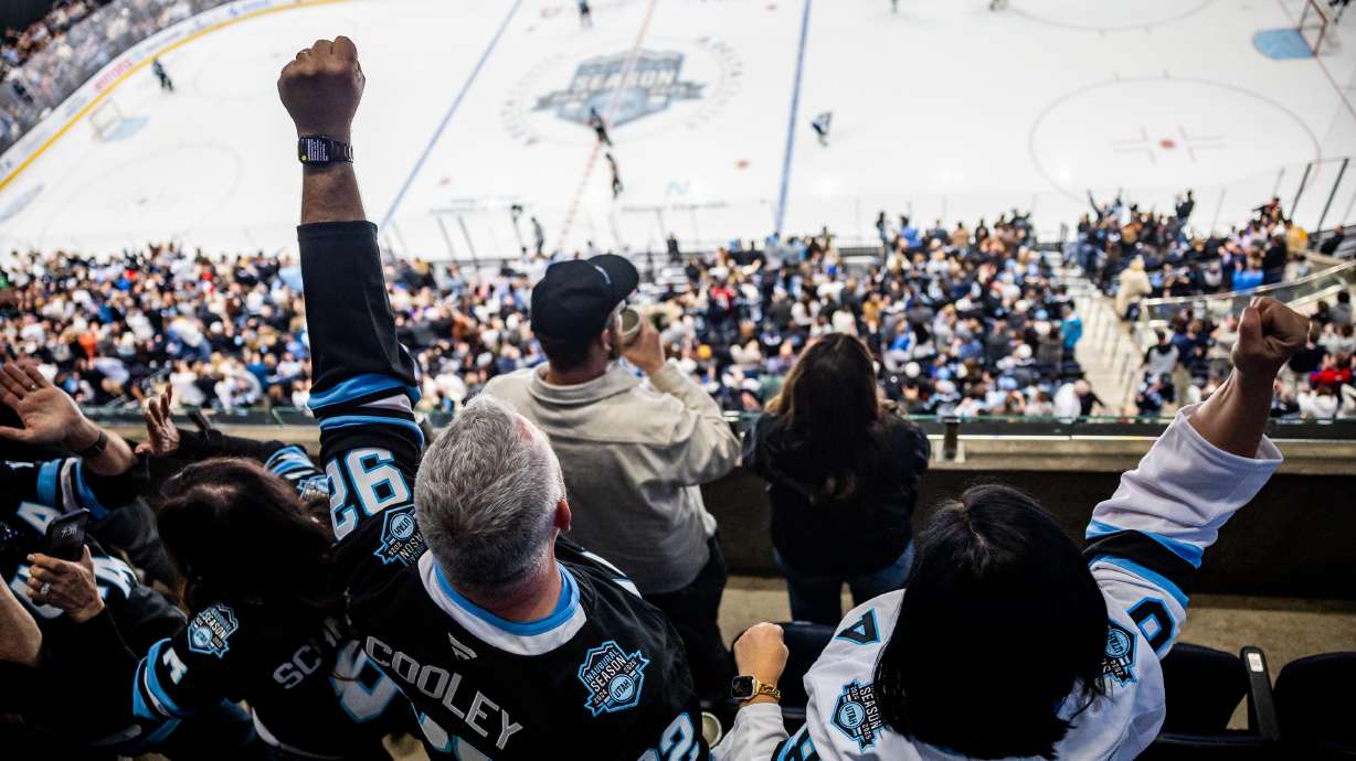 Utah Hockey Club fans cheer after the Utah Hockey Club scores during an NHL game at the Delta Center in Salt Lake City on Saturday, April 5, 2025.