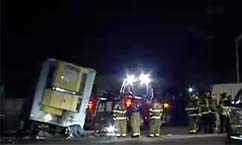Semi trailer full of ham sinks into road