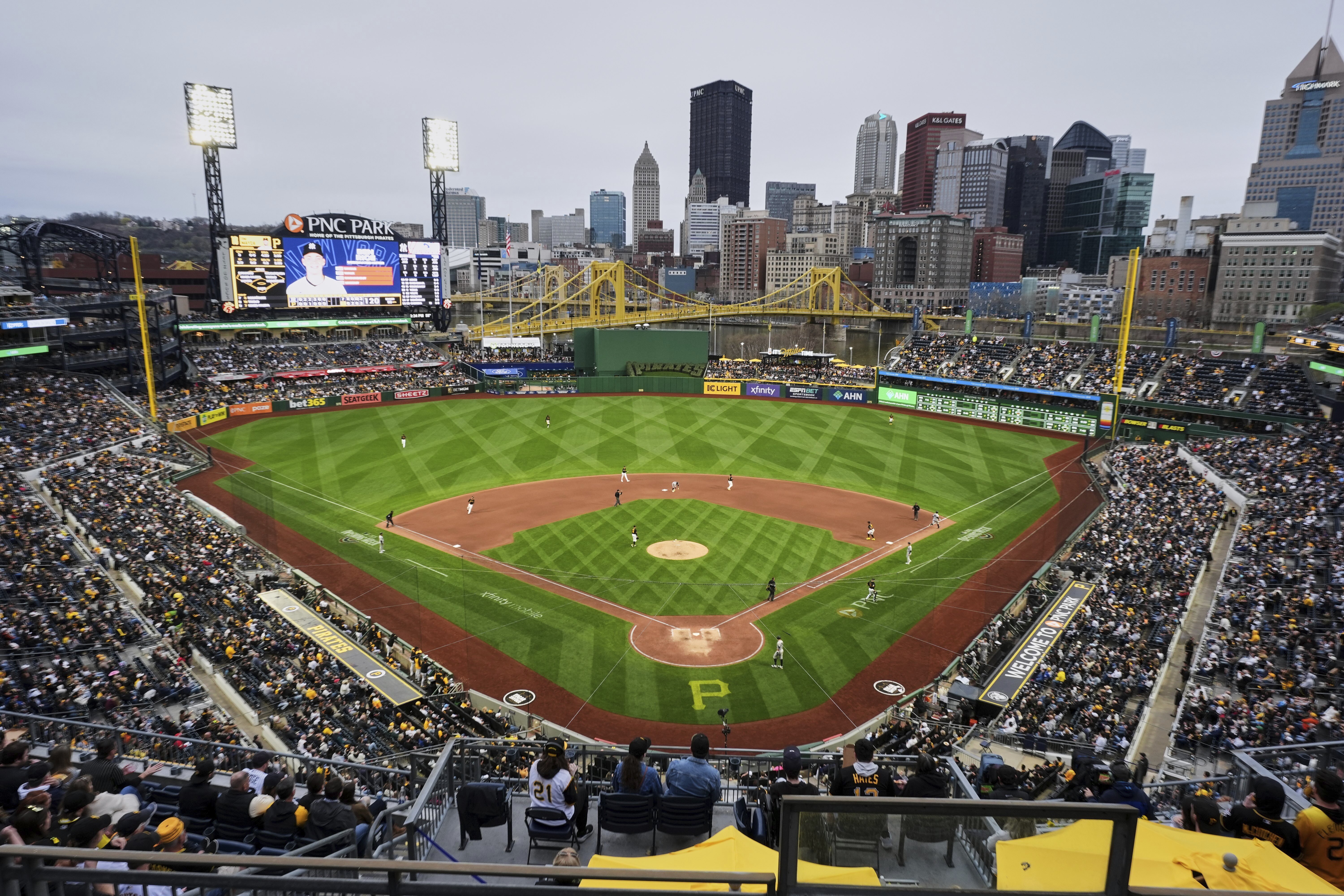 An opening day crowd watches a baseball game between the Pittsburgh Pirates and the New York Yankees at PNC Park in Pittsburgh, Friday, April 4, 2025.