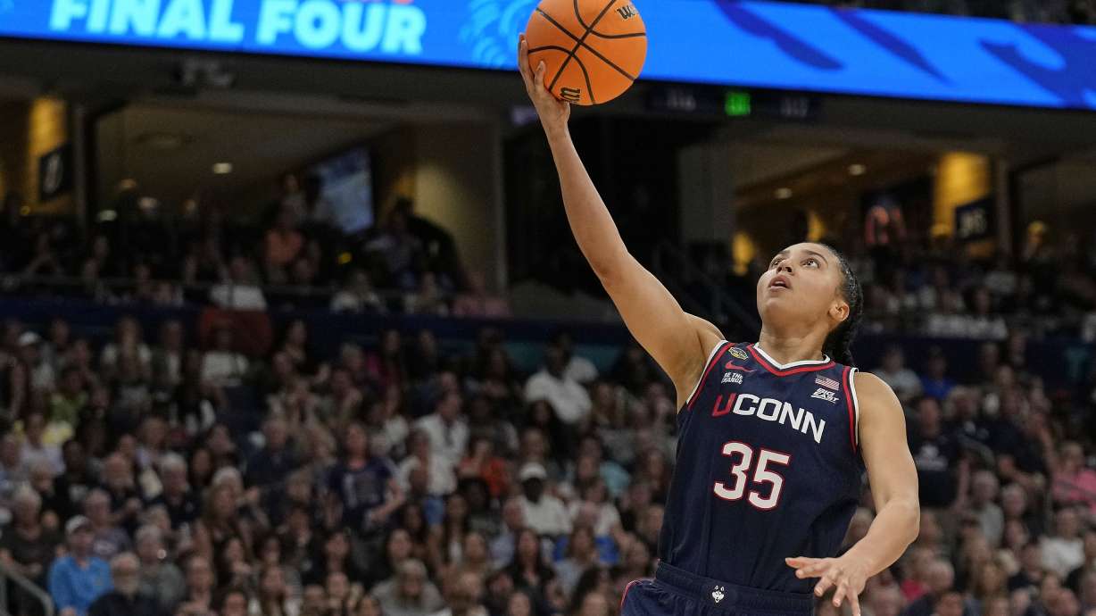 UConn guard Azzi Fudd (35) puts up a shot against South Carolina during the first half of the national championship game at the Final Four of the women's NCAA college basketball tournament, Sunday, April 6, 2025, in Tampa, Fla.