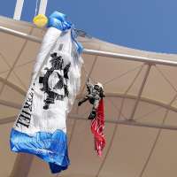 Have You Seen This? Parachute hits stadium roof, leaves man dangling