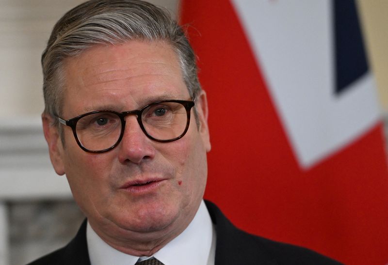 British Prime Minister Keir Starmer looks on, during the day he meets with Barbados' Prime Minister Mia Mottley at Downing Street in London, Britain, Friday. He announced Monday that Britain will invest up to 600 million pounds ($767 million) into a new health data research service. - Eddie Mulholland, Pool via Reuters