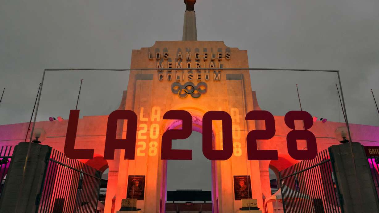 An LA 2028 sign is seen in front of the Olympic cauldron at the Los Angeles Memorial Coliseum on Sept. 13, 2017. Los Angeles has made it official — several 2028 Summer Games events will be held in Oklahoma City.