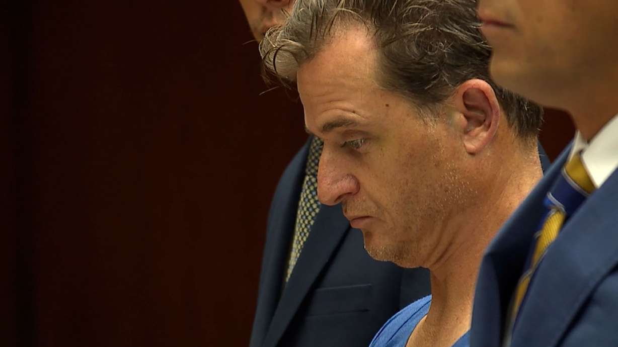 Gerhardt Konig, an anesthesiologist seen here in court in Honolulu, is accused of trying to kill his wife on a popular Hawaii hiking trail, according to a temporary restraining order petition filed by his wife.