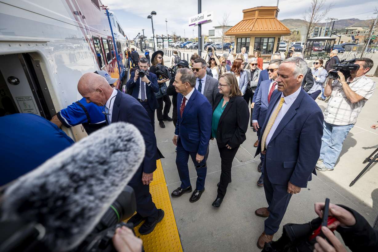 Sen. John Curtis, R-Utah, boards the FrontRunner in Salt Lake City on Monday.