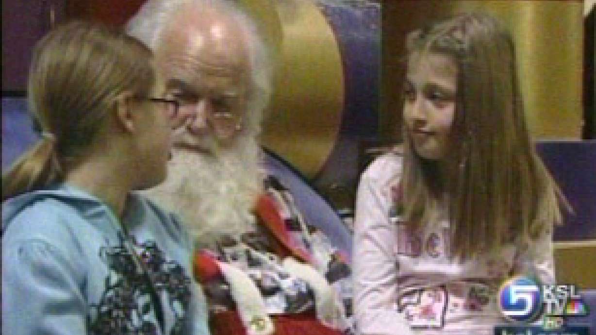 Children line up to give Santa their wish lists