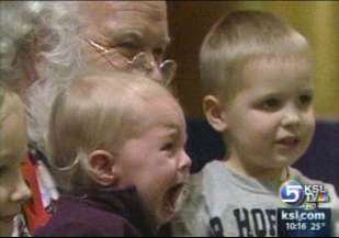 Children line up to give Santa their wish lists
