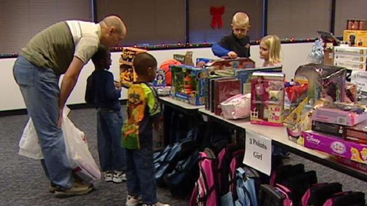 Foster children go shopping at Christmas Store