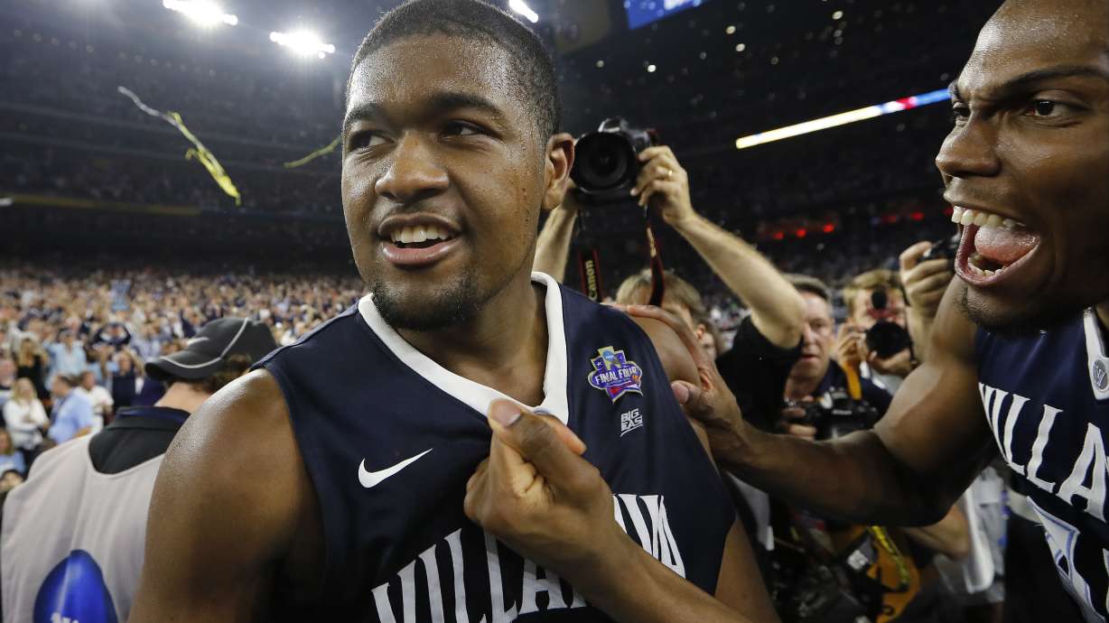 FILE - Villanova forward Kris Jenkins (2) celebrates with team mates after the NCAA Final Four tournament college basketball championship game against North Carolina Monday, April 4, 2016, in Houston.
