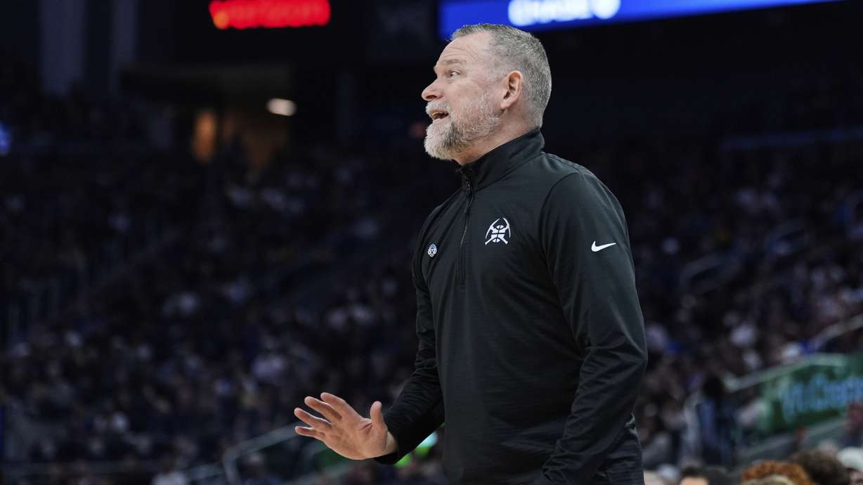 Denver Nuggets head coach Michael Malone gestures during the first half of an NBA basketball game against the Golden State Warriors, Friday, April 4, 2025, in San Francisco.