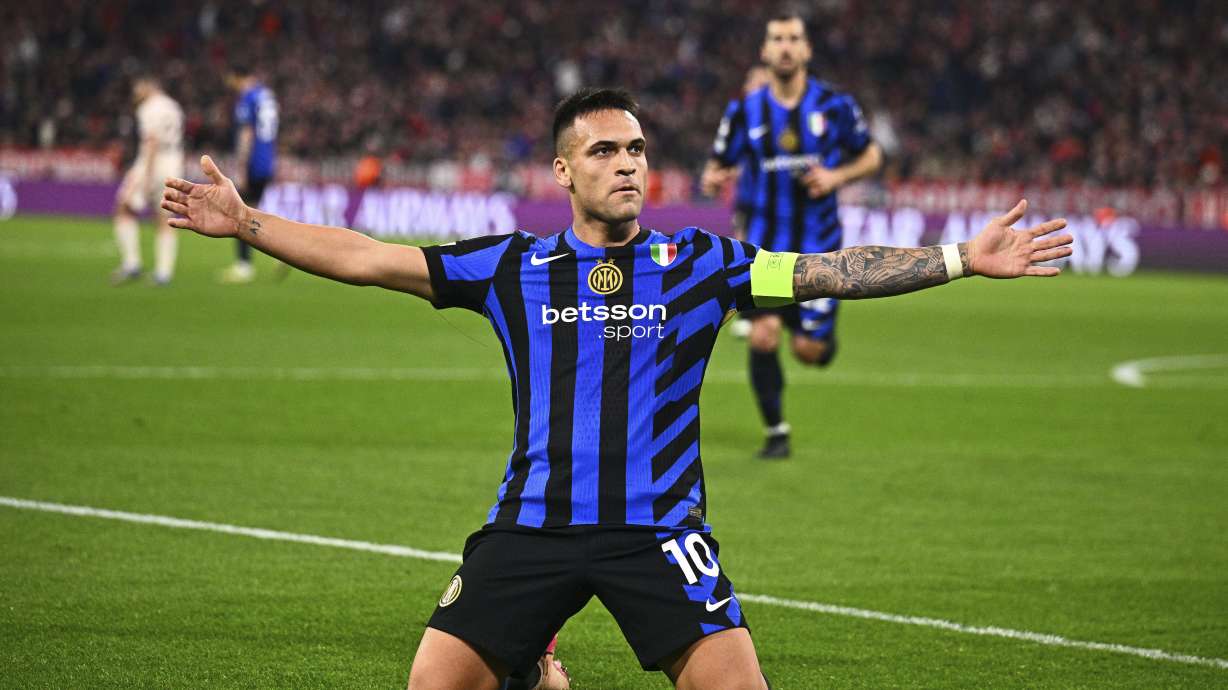 Inter Milan's Lautaro Martinez celebrates after scoring the opening goal during the Champions League quarterfinals first leg soccer match between FC Bayern Munich and Inter Milan, at the Allianz Arena in Munich, Germany, Tuesday, April 8, 2025.