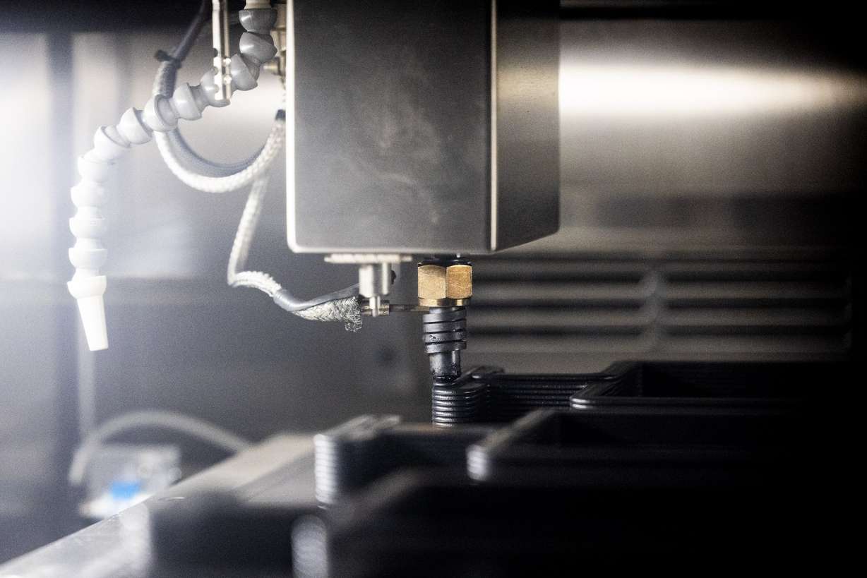 A Juggerbot 3D printer creates an object during an open house hosted by Weber State University and 47G held at the Miller Advanced Research & Solutions (MARS) Center near Hill Air Force Base in Clearfield on April 3.