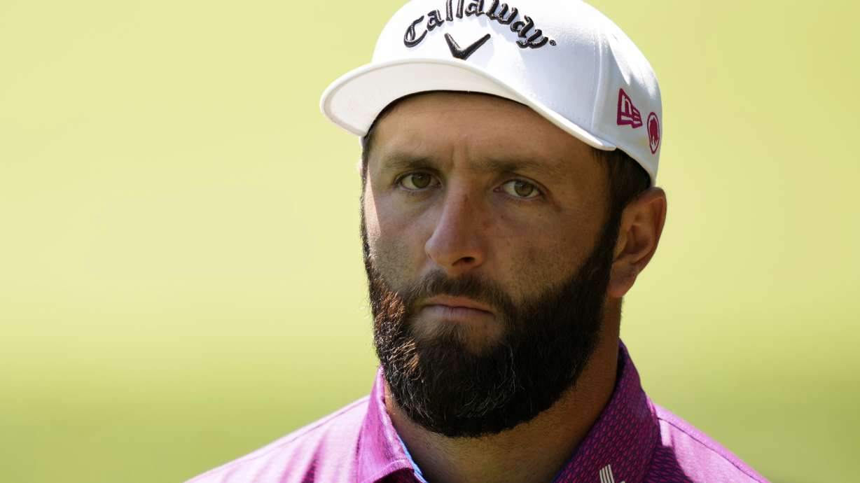 Jon Rahm, of Spain, walks to the 14th tee during a practice round at the Masters golf tournament, Tuesday, April 8, 2025, in Augusta, Ga.