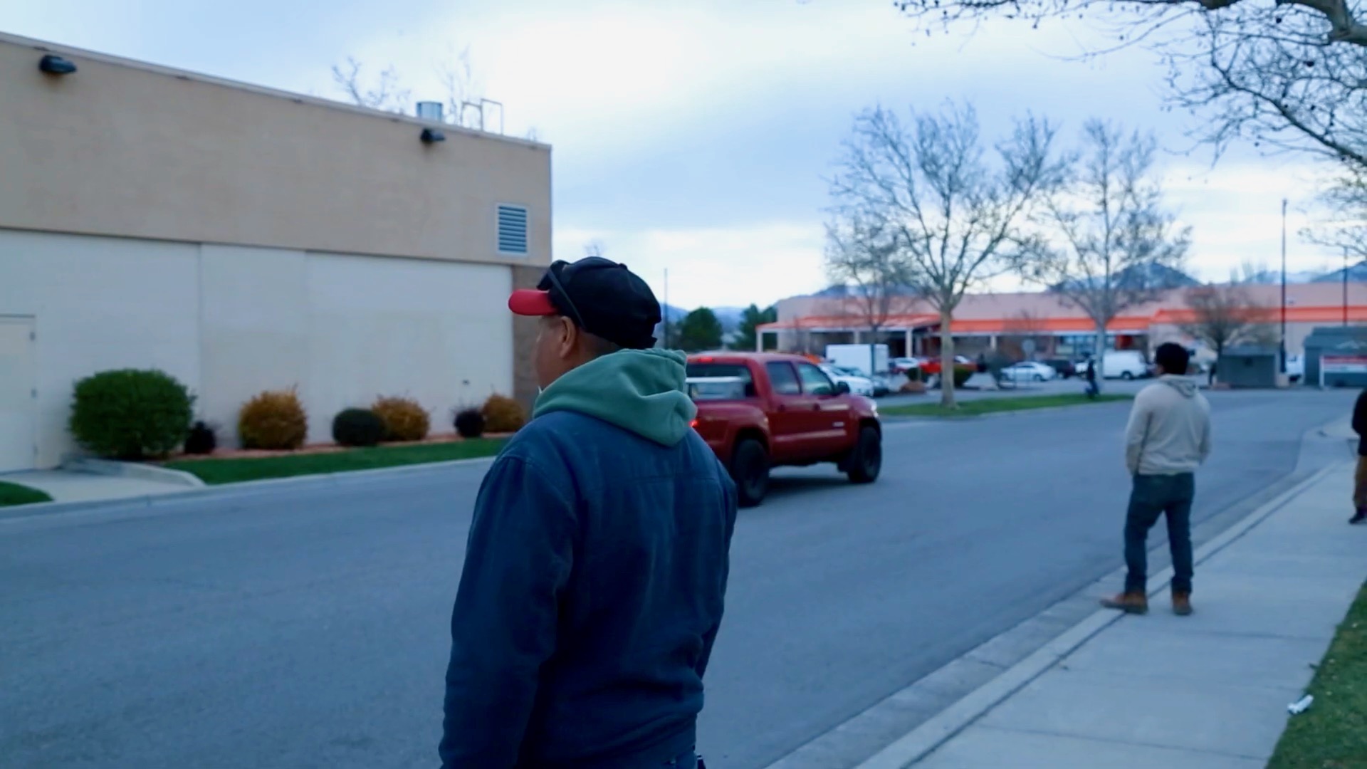 The photo from the documentary "Jornalero: Una Mirada al Frente" shows day laborers in the Salt Lake area seeking jobs. The documentary looks at the lives of three Utah jornaleros, or day laborers.