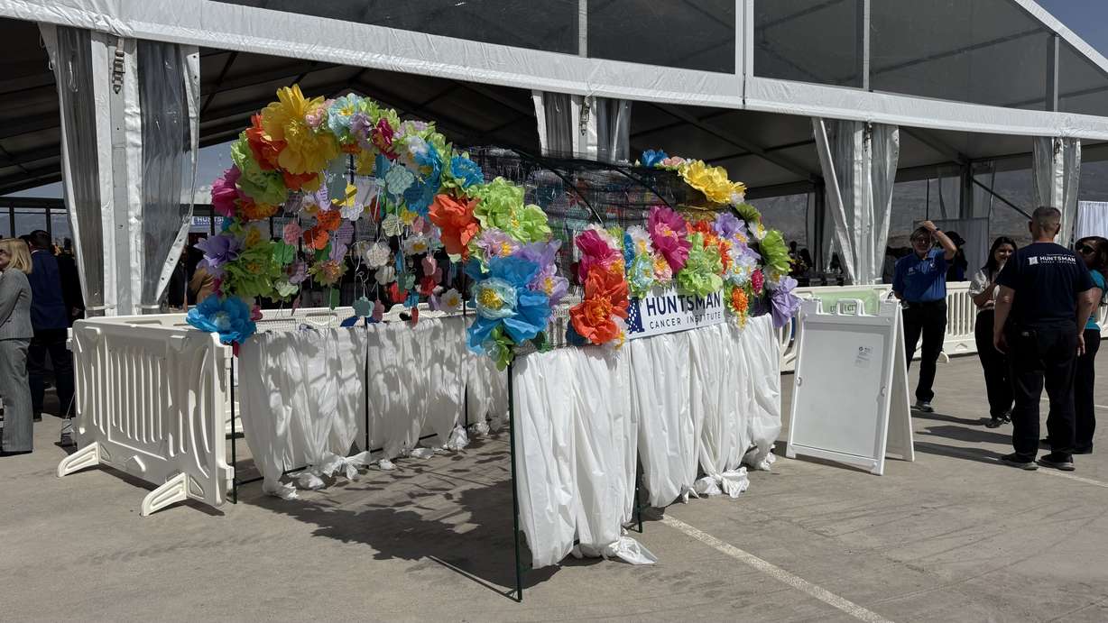An arch, with notes from patients about what they hope the new Huntsman Cancer Institute in Vineyard will do for them, is displayed at the groundbreaking for the future center on Tuesday.